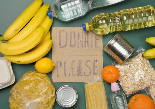 35775652 inscription on the cardboard please donate various products fresh fruits pasta and canned food